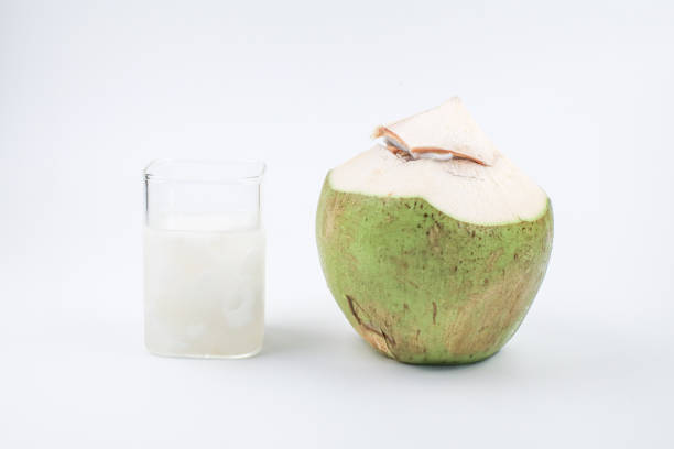 istock Fresh coconut juice on white background. Organic healthy tropical drink. 2196654783