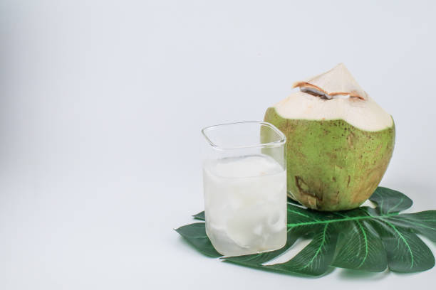 istock Fresh coconut juice on white background. Organic healthy tropical drink. 2196654785