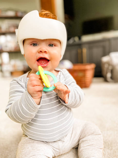istock Baby wearing head shaping helmet 2196656058