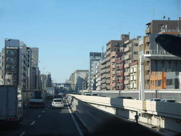 Driving by the urban highway in Tokyo suburbs residential area