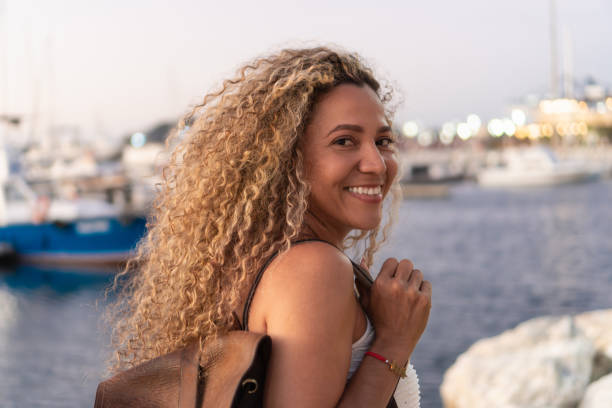 Free Stock Photo of Smiling blonde woman posing at the coastline ...