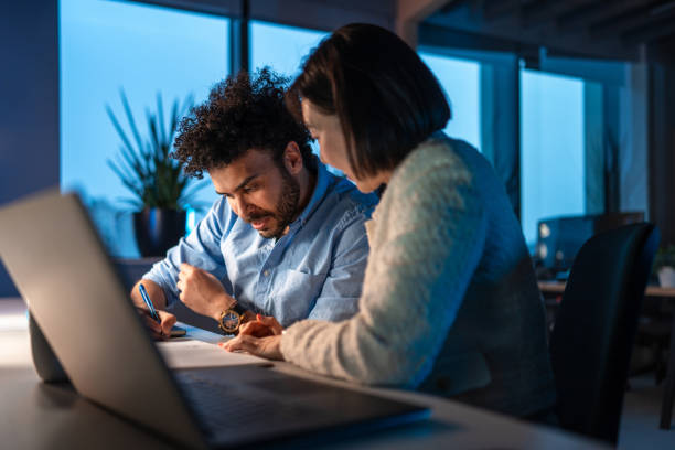 istock Diverse Business Colleagues Collaborating After Hours 2196661260