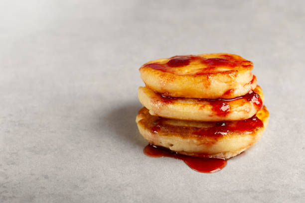 istock hot and tasty pancakes with jam for breakfast 2196663453