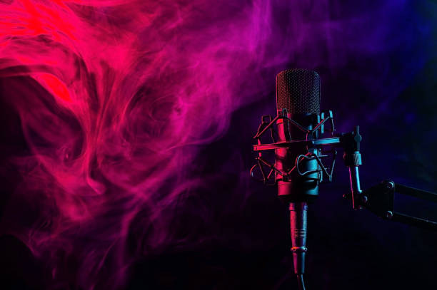 istock Professional microphone in red blue smoke on a black background. 2196665654