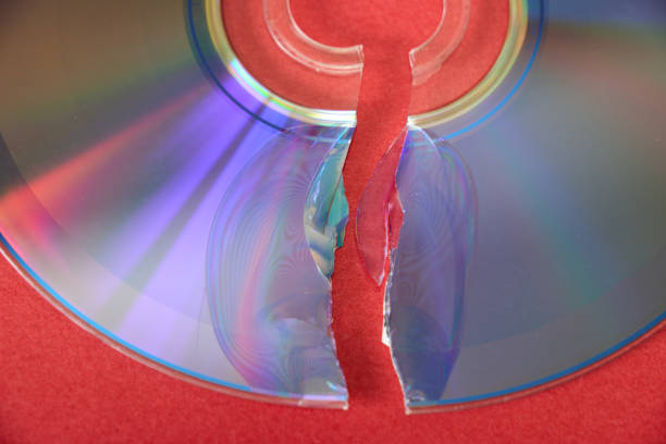 Close up of a cracked optical disc.