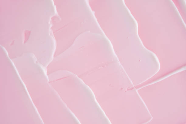 istock Swatch with white cream texture on a pink background. 2196668929