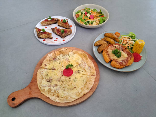 Pizza Carbonara With Smoked Beef And Parmesan Cheese. Chicken Tomato Mozzarella With Breaded Chicken, Tomato Sauce, Cheese, Salad, Potato And Corn. Mini French Toast With Rasberry Jam. Honey Mustard Salad With Grilled Chicken And Mixed Salad. Food Menu.