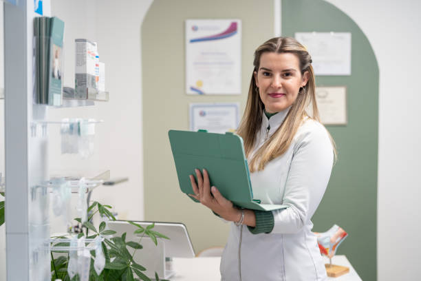 istock Healthcare professional using Ipad in a clinic 2196672168