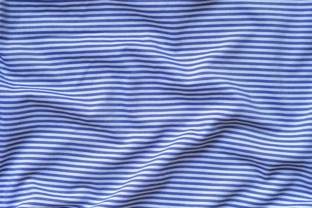 istock Blue and white striped fabric background. Blue and white striped fabric background texture 2196676052