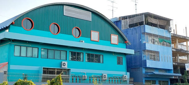 istock exterior mixed design the building using corrugated metal roof window frame circle shape and square ventilation vent 2196680370