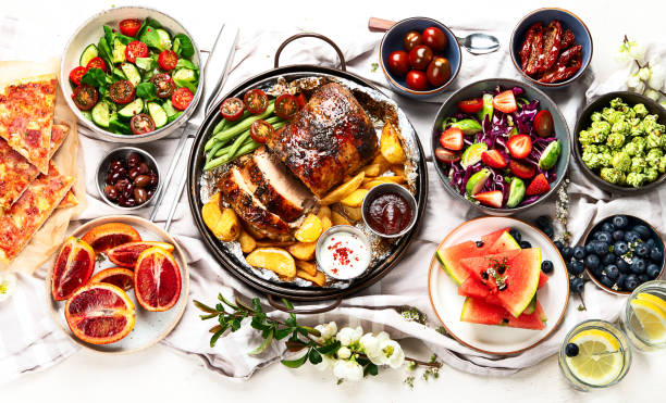 istock Family dinner or lunch. Many dishes on the table. 2196686161