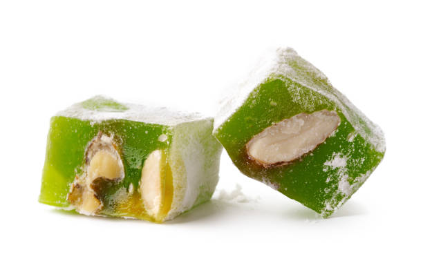 istock Green Turkish delight with nuts served on a clean background 2196686273