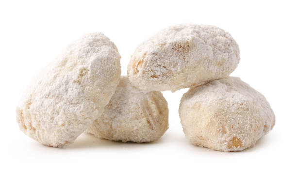 Delicious powdered nut confections arranged artistically on a white background