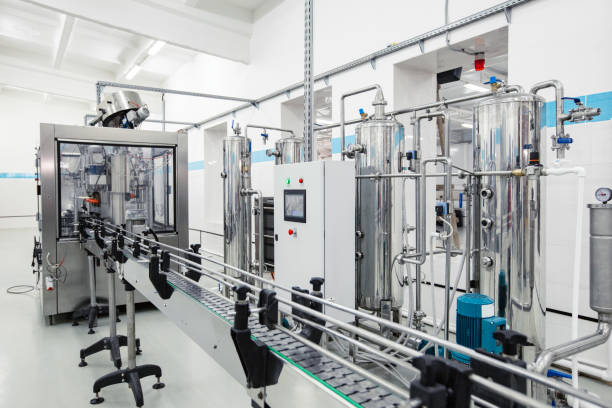 istock Modern processing line featuring stainless steel machinery in a clean factory environment 2196688308