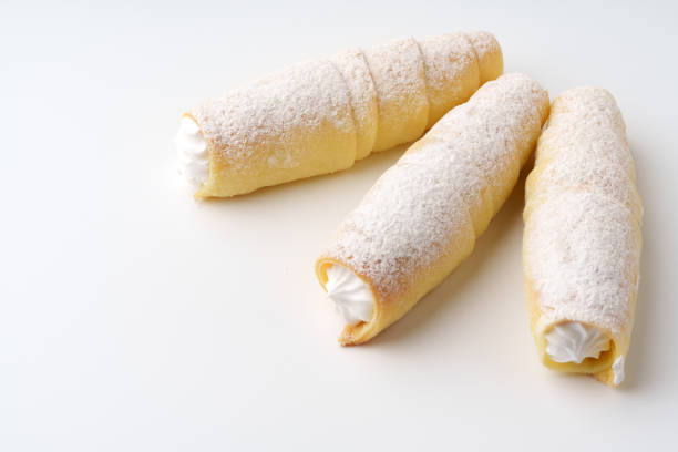 istock Delicious cream-filled pastries on a light background showcasing culinary artistry and dessert indulgence 2196688349