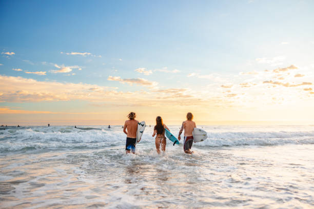 istock Surfers at Sunrise on Gold Coast, Australia 2196688411