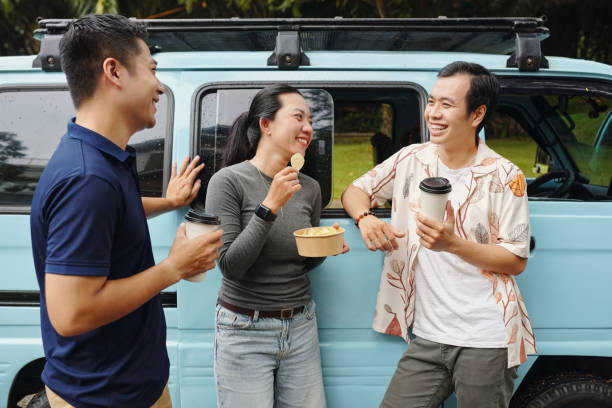 istock Friends Having Snack During Journey 2196691606