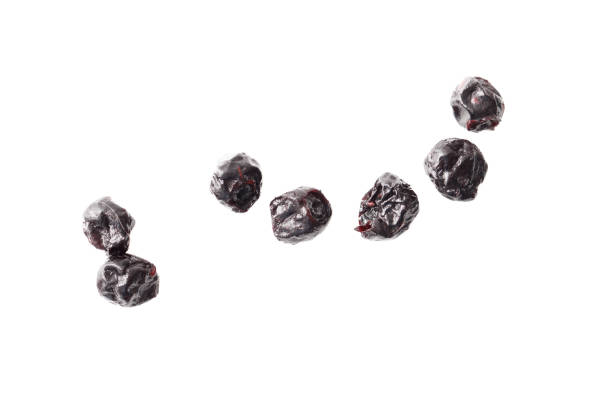 Dried blueberries isolated on white background. Close-up.