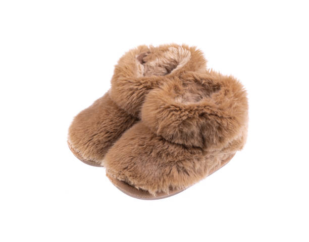 istock brown fur baby boots isolated on white background 2196700384