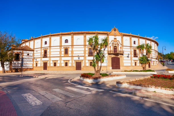 Ronda, Spain - December 8, 2007: Barns of Arena, People are visiting the bullring at Ronda. The Bullring of ronda is one of the oldest operational bullrings in Spain.