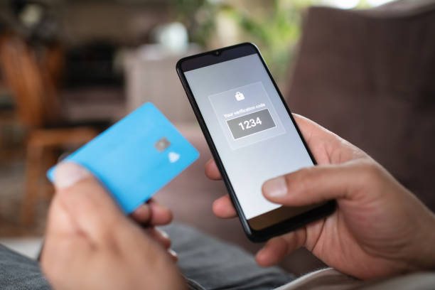 istock Man with smartphone and credit card 2196703956
