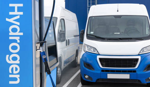 istock Hydrogen filling station on a background of vans. 2196704111