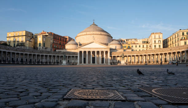 Naples- Italy- March 11th  2022. Early morning view of Neoclassical Style of Basilica of San Francisco de Paula at Plebiscite Square one of the bigest square in Italy.