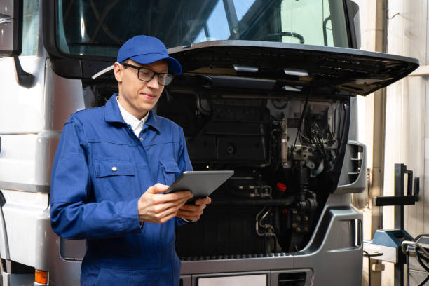 istock Trucks repair in car service. 2196705640