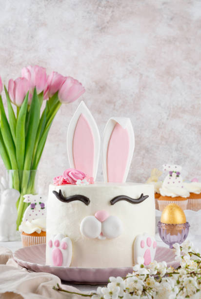 istock Easter bunny cake on a plate on a concrete background. Funny food idea. Copy space. 2196707062