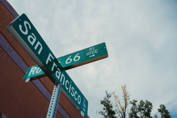 Road junction on in front of a blue sky