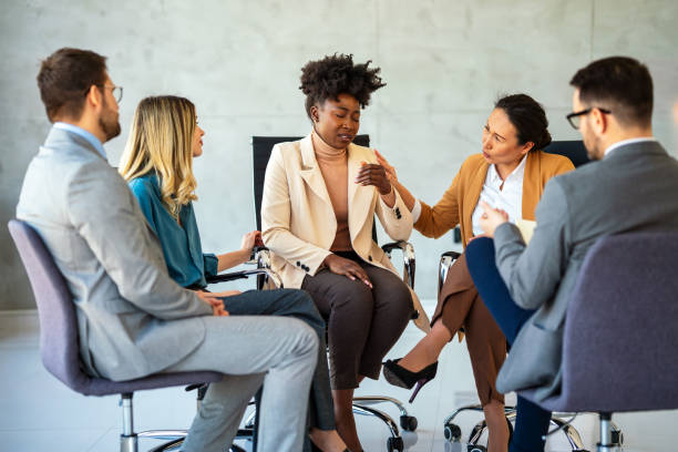 istock Support with group, therapy and mental health with help, people together talking about problem 2196708011
