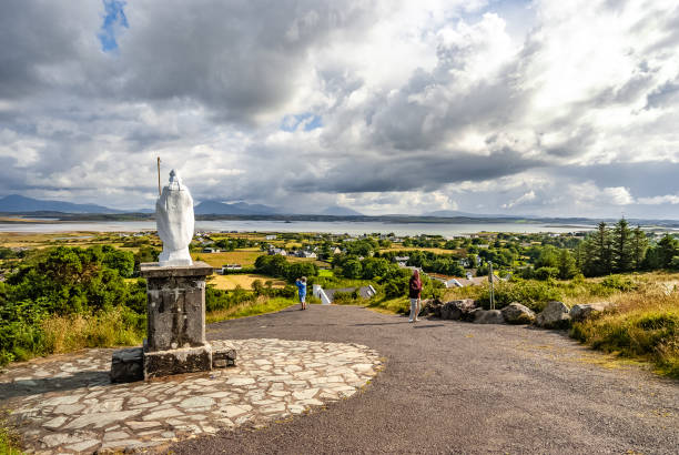 July 19th 2009 Croagh Patrick, Ireland, is a mountain with a height of 764 m (2,507 ft). It is a pilgrimage site associated with the cult of Ireland's patron saint, Saint Patrick. Statue of Saint Patrick.