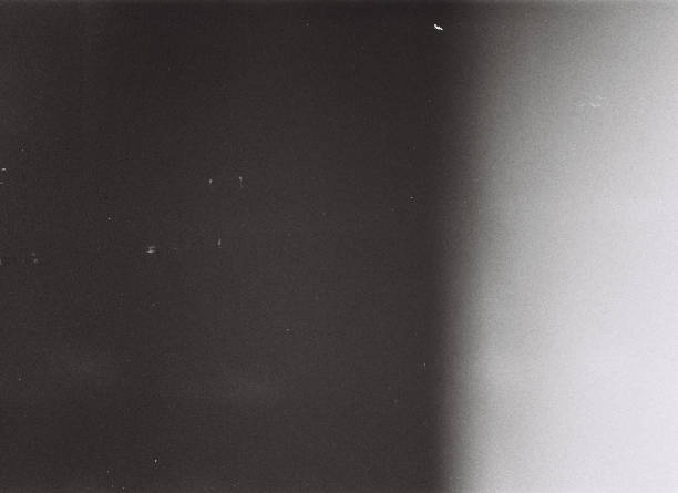 istock Burnt 35mm Film Grain Texture with Light Leaks 2196710161