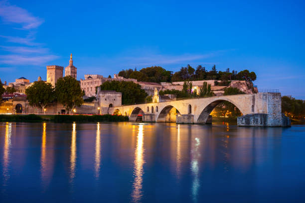 Pont Saint Benezet bridge, Palace of the Popes or Palais des Papes and Avignon Cathedral aerial panoramic view in Avignon city in France