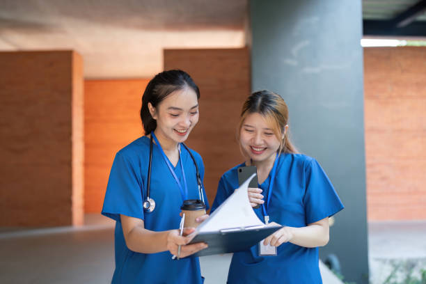 istock Doctors reviewing notes and enjoying coffee during a break 2196713409
