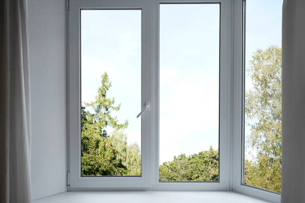 istock View from the window on the garden green trees. 2196716232