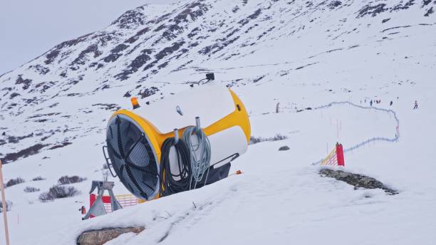 Snow Cannon Artificial Snowmaking Machine for Skiing Slope Maintenance at Ski Resort in Austrian Alps Mountains