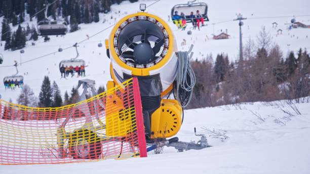 Snow Cannon Artificial Snowmaking Machine for Skiing Slope Maintenance at Ski Resort in Austrian Alps Mountains