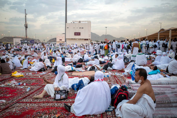 Praying believers in Makkah, Kabah. Saudi Arabia