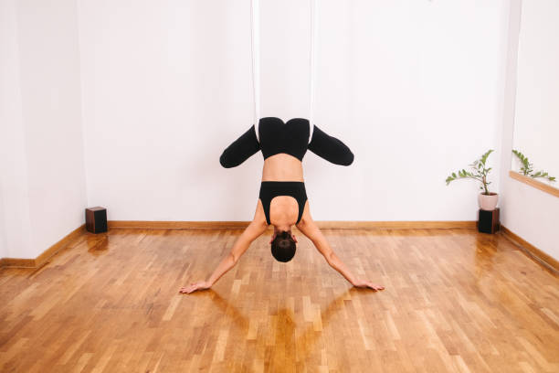 istock Stretching on aerial yoga silk 2196721014