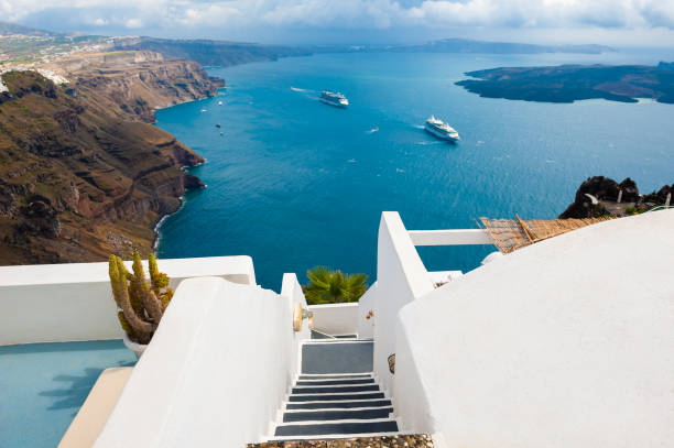 Santorini island, Greece. Rainy clouds over the island. Beautiful sea view. Travel and vacation concept