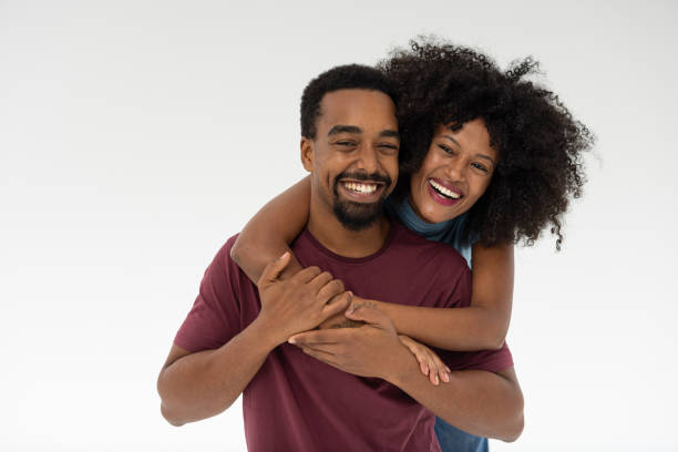 istock Couple enjoying playtime with warm smiles 2196722338