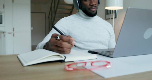 istock A man is talking on a video chat on a laptop 2196722816