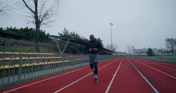istock A man is running in the stadium 2196724739