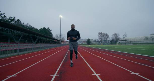 istock A man is running in the stadium 2196724757