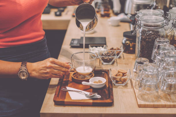 istock Barista is working in a coffee shop 2196728384