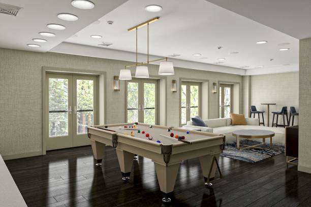 istock Modern Indoor Lounge Area Featuring a Billiard Table and Contemporary Decor 2196730020