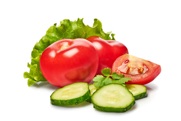 istock Fresh vegetables tomatoes, cucumbers, and lettuce isolated on a white background. Clipping path 2196731780