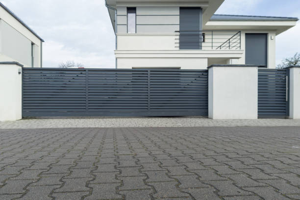 istock Modern House with Sliding Metal Gate 2196740460