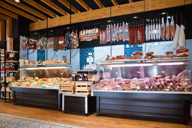 istock Various meats and cheese on display at deli shop 2196741154